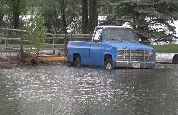 Old Pickup Truck Stuck in Flood Waters