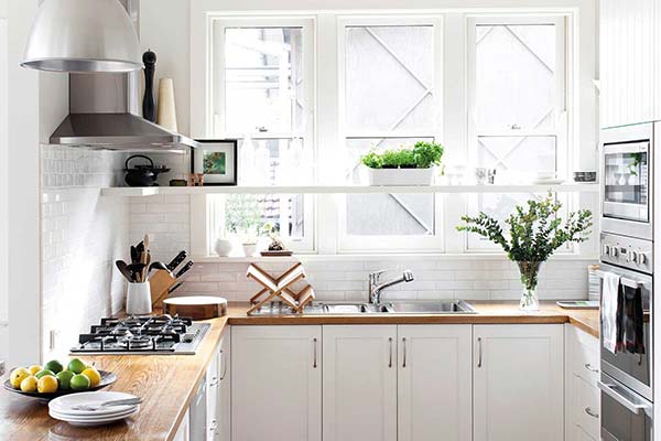 White Shaker Kitchen with Wood Counter