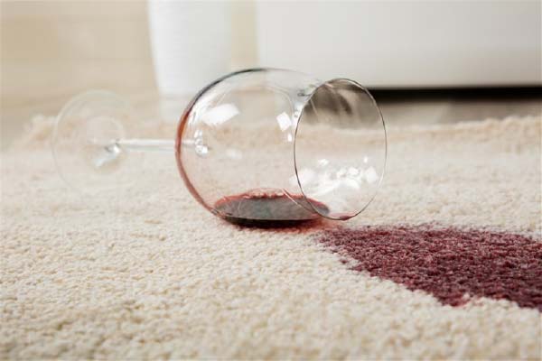 Glass of Red Wine Spilt on Carpet