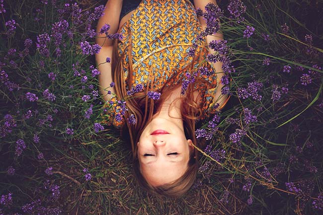 Girl Sleeping Beside Lavender