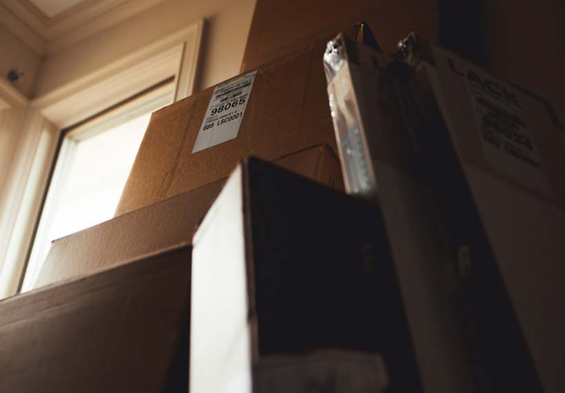 Boxes Leaning Against Wall