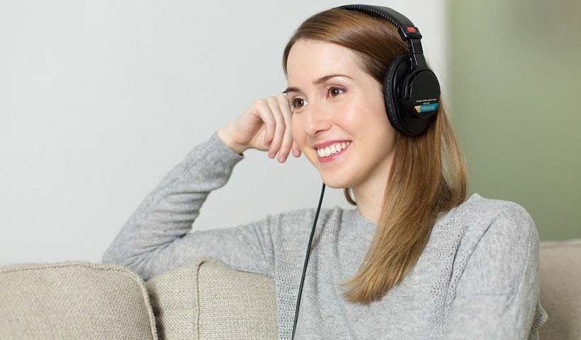 Smiling Woman Wearing Headphones