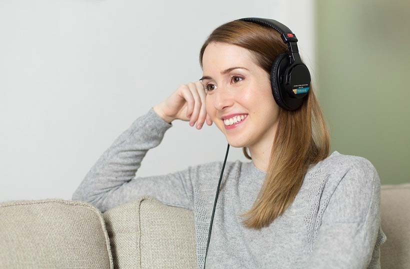Smiling Woman Wearing Headphones