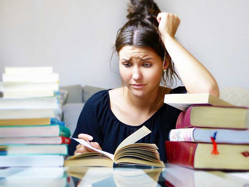 Stressed Girl Reading Books