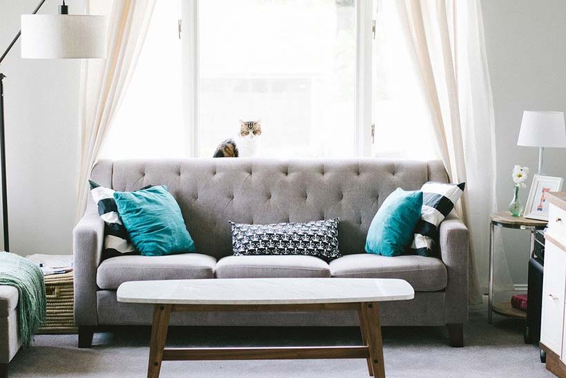 Grey Sofa & Teal Pillows