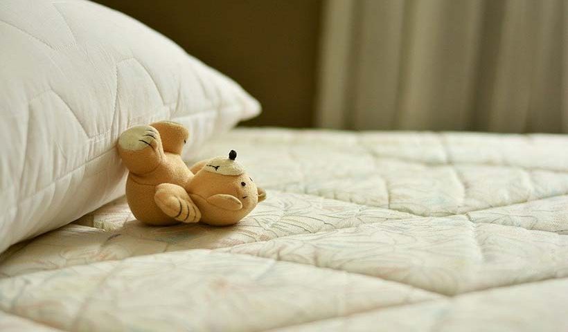 Teddy Bear on Mattress