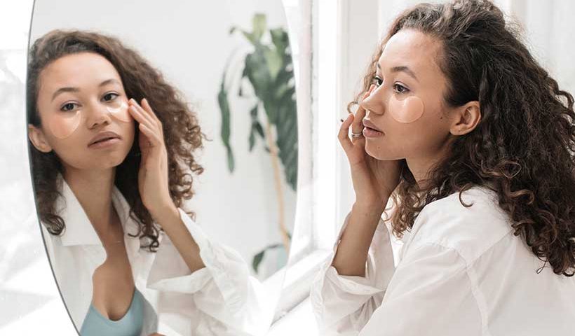 Girl Applying Eye Skin Care