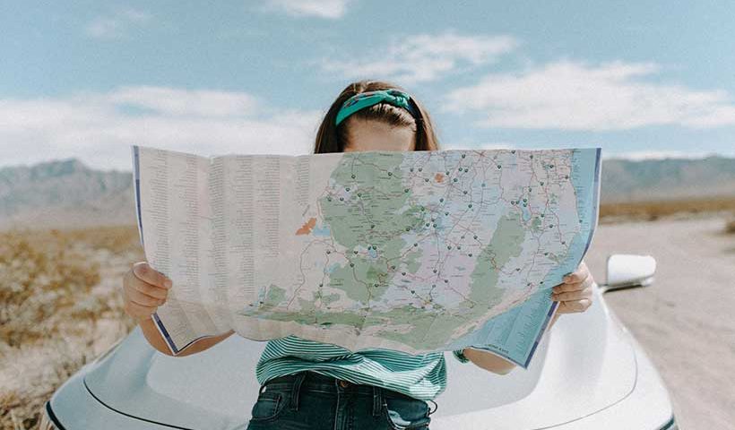 Girl Reading Map