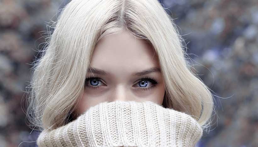 Beautiful Blonde Girl Wearing Winter Wool